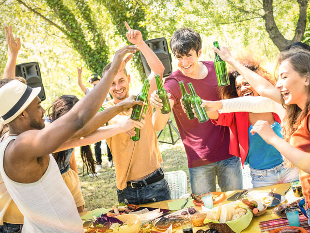 A bunch of college kids playing drinking games midday