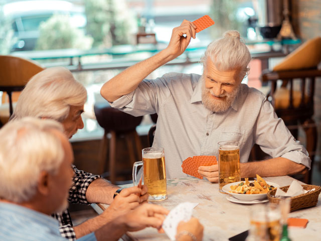 A group of Seniors playing the Asshole drinking game