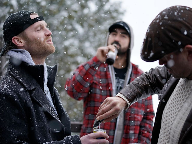 Shoresy, Ted Hitchcock and Goody drinking beers outside during the Shoresy Drinking Game