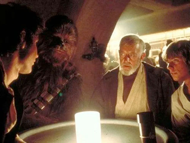 Han Solo, Chewbacca, Luke Skywalker and Obi Wan Kenobi ready to order a round of drinks at Mos Eisley Cantina